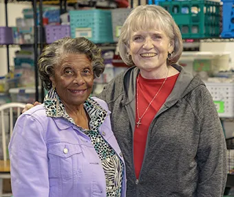 Velma Green and Cindy Potee work together at The Shepherd’s Staff.