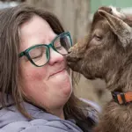 Kate Fisher holds her Nigerian Dwarf goat, Steve.