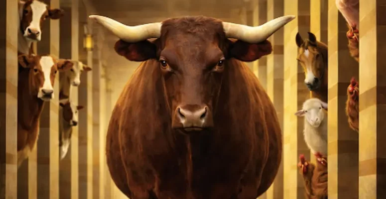 A large brown bull stands in a barn aisle, flanked by cows, goats, and sheep peering from stalls.